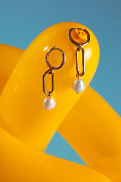 Pearls on yellow balloon