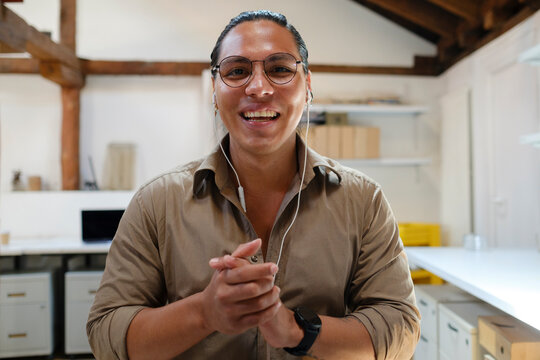 Young man attending video call looking at camera