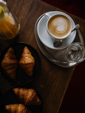 Cup of coffee and croissant for breakfast