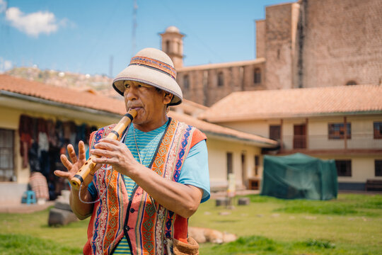 Peruvian Man playing Traditional Flute