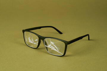 eyeglasses with broken lenses