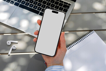 Mockup phone with white screen . Outdoor Business Setup