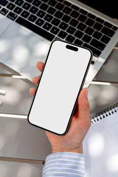 Mockup phone with white screen . Outdoor Business Setup