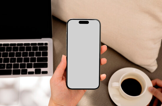 Business breakfast phone with white Screen with  Coffee and Laptop