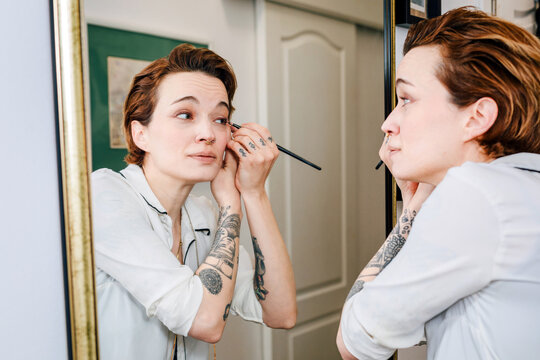 Woman doing makeup