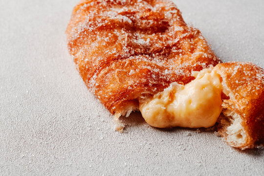 squished xuixo, catalan pastry filled with custard