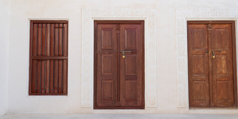 traditional qatari house exterior at the national qatar museum.