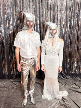 Couple in Moon Masks