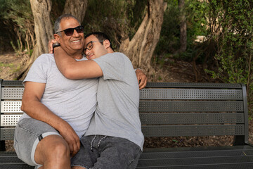 Embrace Of Love: Father And Son Sharing A Moment.