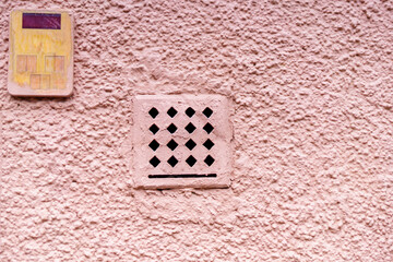 DIY exhaust grille shaped like a spade suit, a quirky home ventilation solution