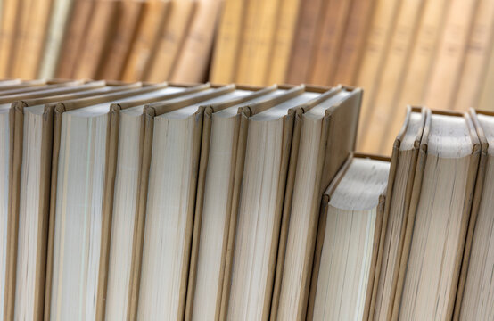 Close up of periodical books on shelf