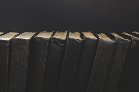 Close up of old periodical books on shelf
