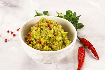 Guacamole with avocado, tomato and chili