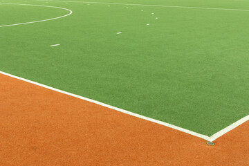 orange and green sports field