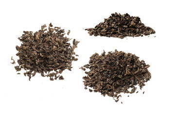 Dried tea leaves isolated on a white background.