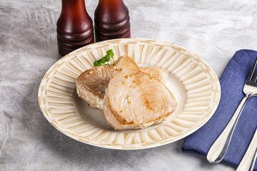 Roasted red tuna steak in the plate