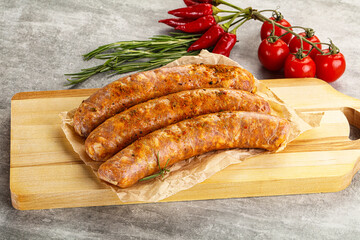 Raw sausages with spices and herbs