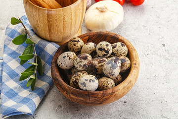 Raw quail eggs in the bowl