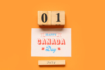 Greeting card and calendar on orange background. Canada Day concept