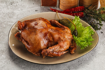 Baked small chicken with spices