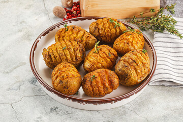 Baked baby potato with thyme