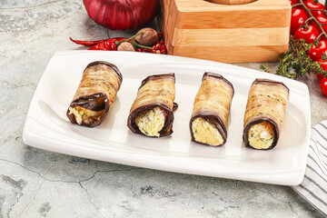 Baked eggplant roll with cheese