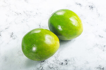 Two ripe green exotic avocado fruit