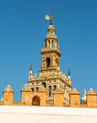 La Giralda (translated to The Giralda), the beautiful bell tower of Seville's Cathedral, Spain