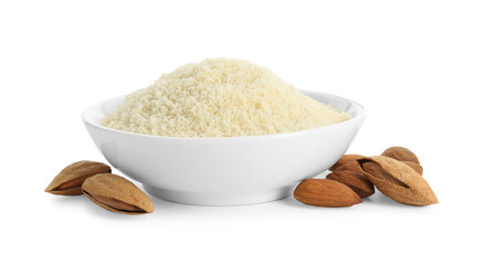 Fresh almond flour in bowl and nuts isolated on white