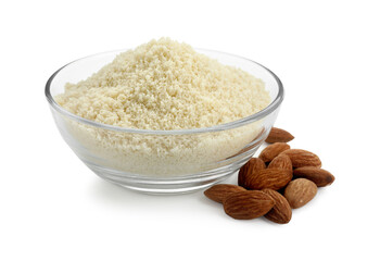 Fresh almond flour in bowl and nuts isolated on white
