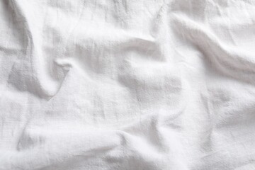 Texture of white fabric as background, top view