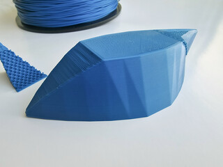 Abstract 3D printed shape on white background
