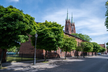 Characteristic red brick buildings in Żyrardów, Poland, have been repurposed into charming living spaces, blending historic industrial architecture with modern residential functionality.


