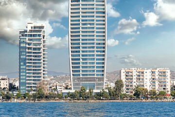 Modern skyscrapers rising above the mediterranean sea in Limassol, Cyprus