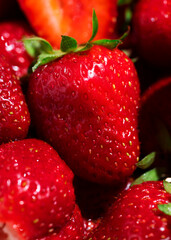 Strawberry close-up lies on strawberries