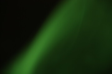 green smoke on a dark background, colourful abstract, green fog, minimalism, line of light	
