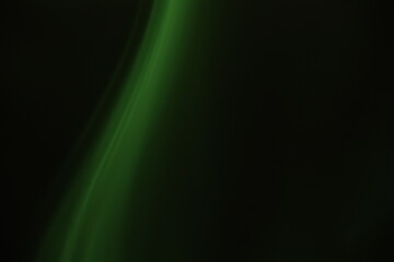 Green lines, green smoke on a dark background, colourful abstract, green fog, minimalism, line of light	

