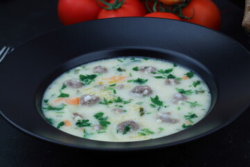Meatball soup with carrot and potatoes named ekşili terbiyeli sulu köfte or eksili kofte