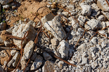 Broken reinforced concrete slabs with protruding reinforcement