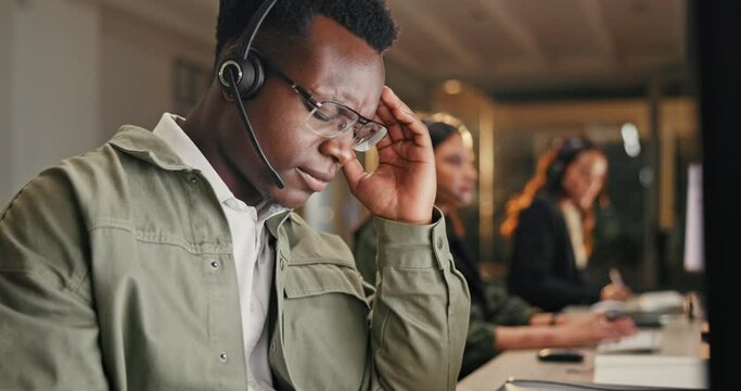Burnout, stress and black man with headache in call center for customer service crisis and tired with brain fog. Telemarketing, African guy and temple pain for 404 glitch and client support mistake