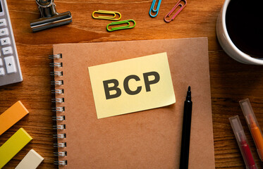 There is sticky note with the word BCP. It is an abbreviation for Business Continuity Plan as...