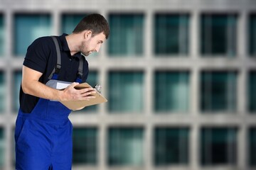 worker inspecting new building. maintenance.