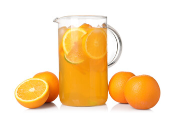 Freshly made lemonade in jug and oranges isolated on white