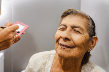 Senior Woman Enjoying Makeup Session