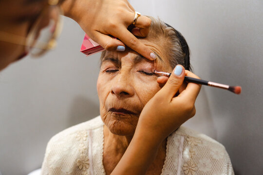 Senior Woman Getting her Makeup Done