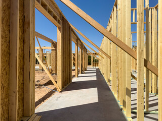  Wood House Frame Under Construction work in neighborhood
