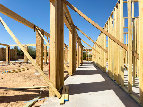 Residence Wood House Frame Under Construction work in neighborhood