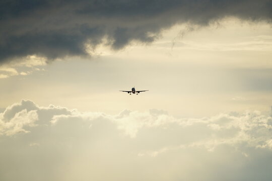 airplane in sunset skies