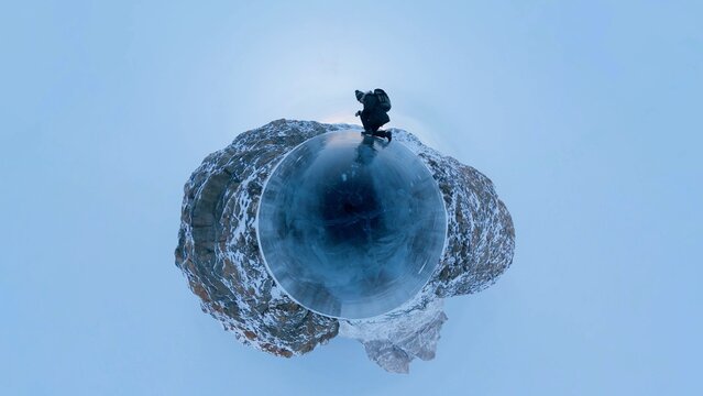 Kneeling on Arctic ice - eco grief, environmental sorrow solastalgia