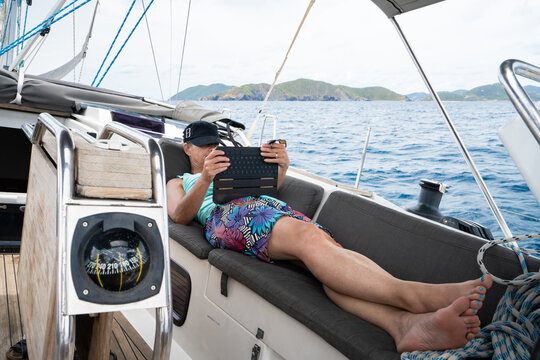 Relaxing on  Sailboat During Caribbean Ocean Sailing Trip